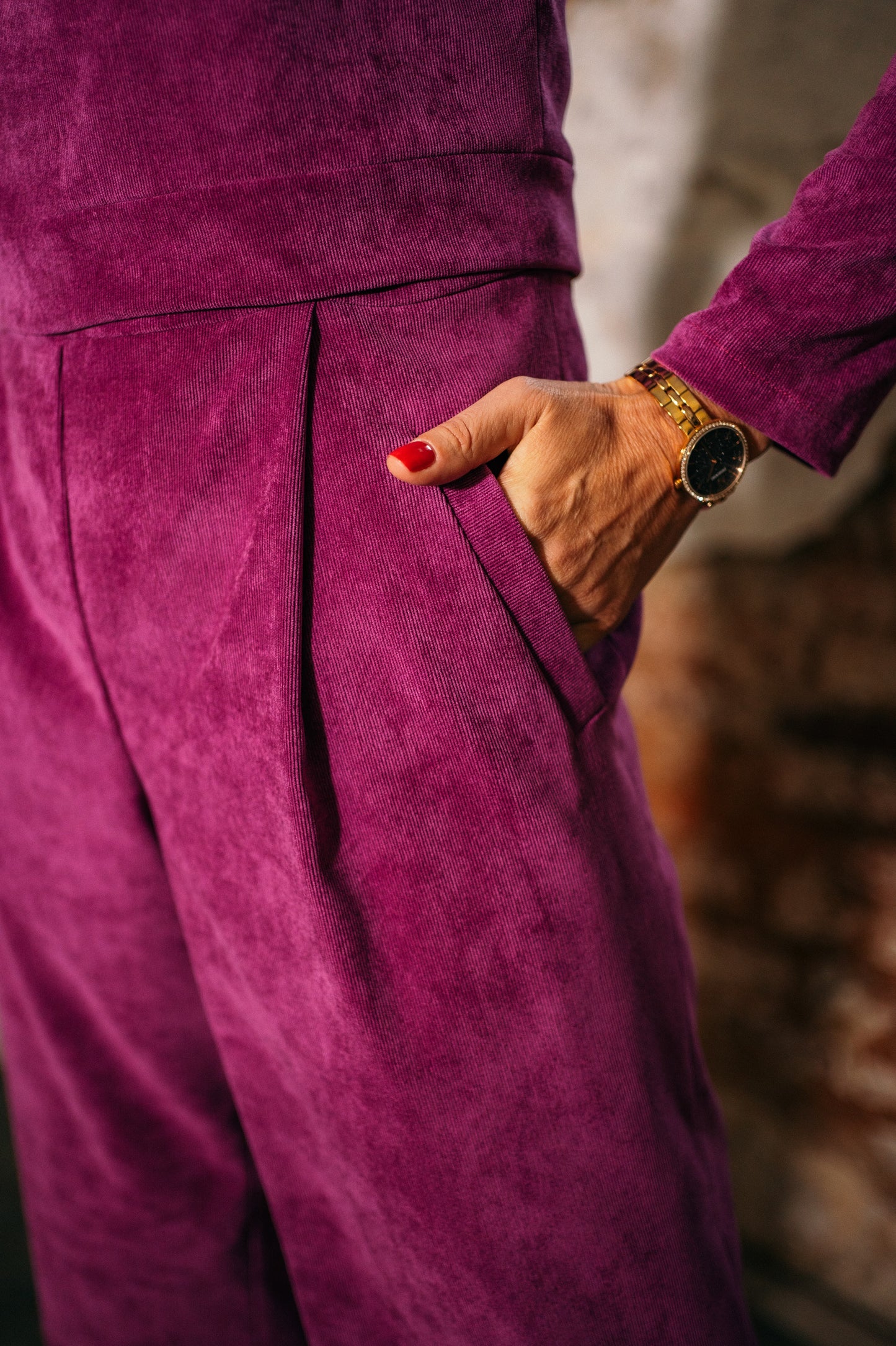 Magenta jumpsuit of wrinkle-free velour fabric