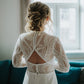 lace wedding dress from the back with a cutout