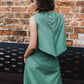 mint green vest or overtop with silver snaps on the back as closure
