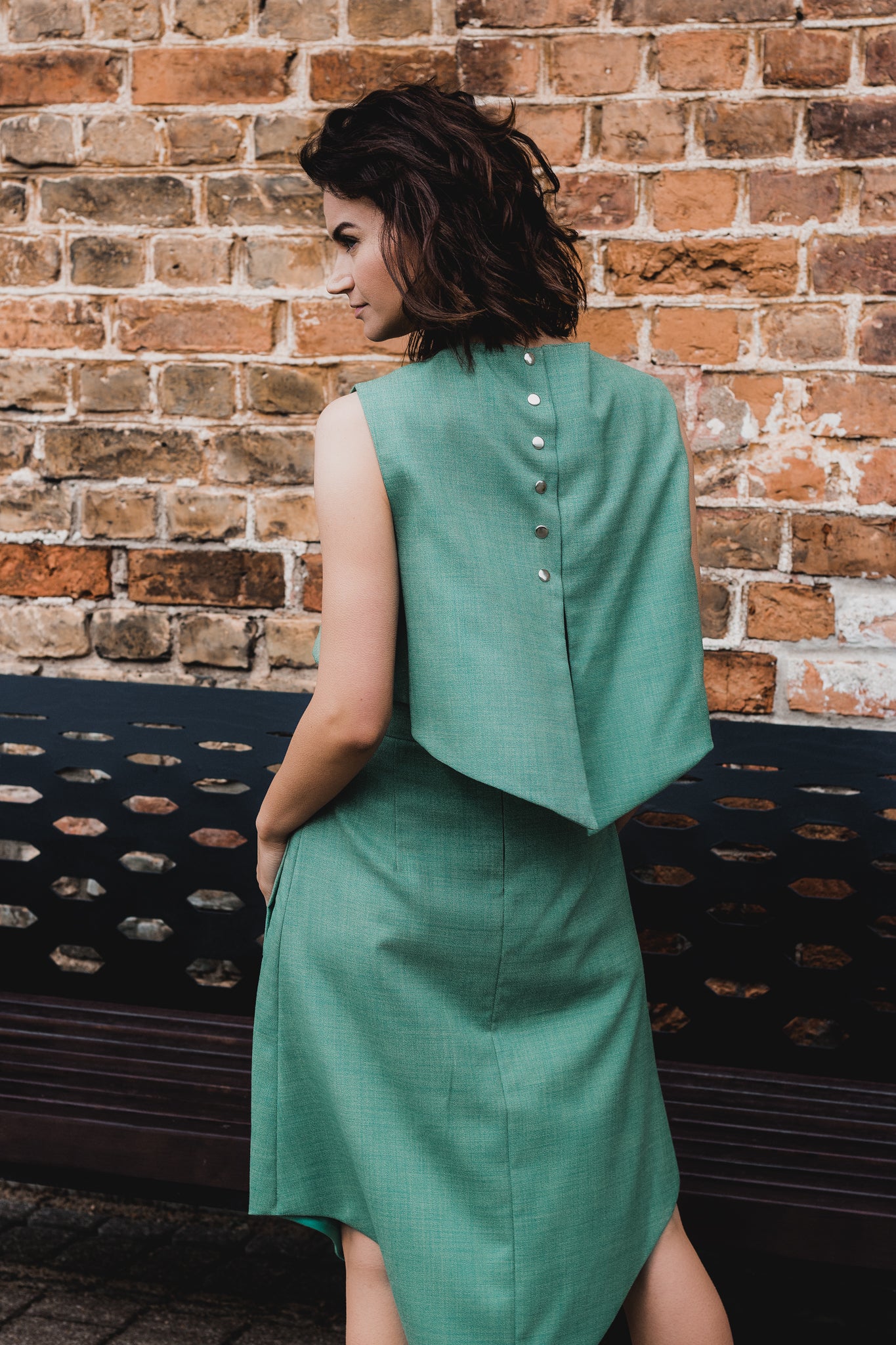 mint green vest or overtop with silver snaps on the back as closure