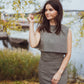 beautiful woman in autumn view in a three piece dress, that consist of a pencil skirt, a corset top and an overtop