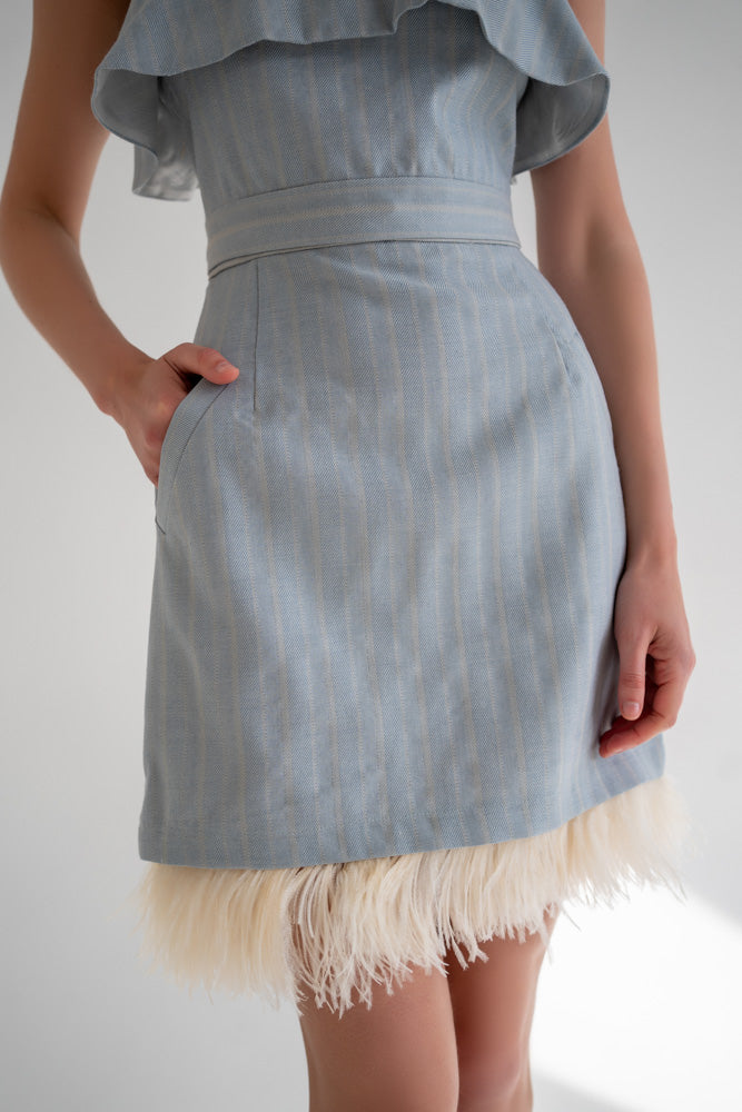 light blue wool skirt with pockets and feather